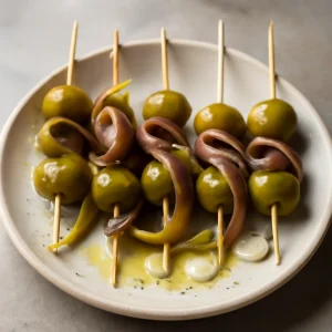 Baszk tapas étel olívabogyóval, szardellával és paprikával